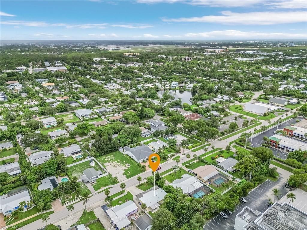 1281 10th Street North Naples, FL 34102 - Photo 29 of 31 Aerial perspective of suburban area