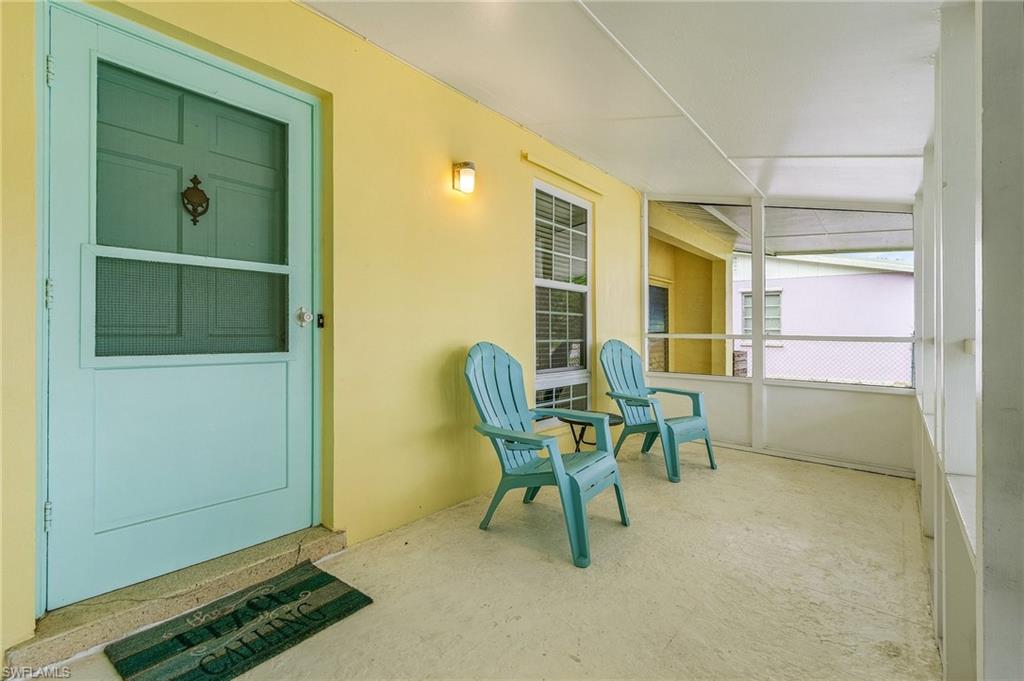 1281 10th Street North Naples, FL 34102 - Photo 6 of 31 Entrance to property with covered porch