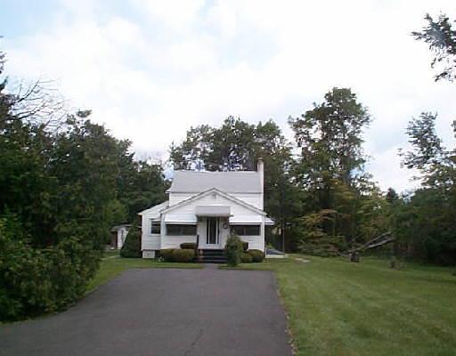 25 Peck Road Danbury, CT 06811 - Photo 1 of 1 a view of a house with a big yard plants and large trees