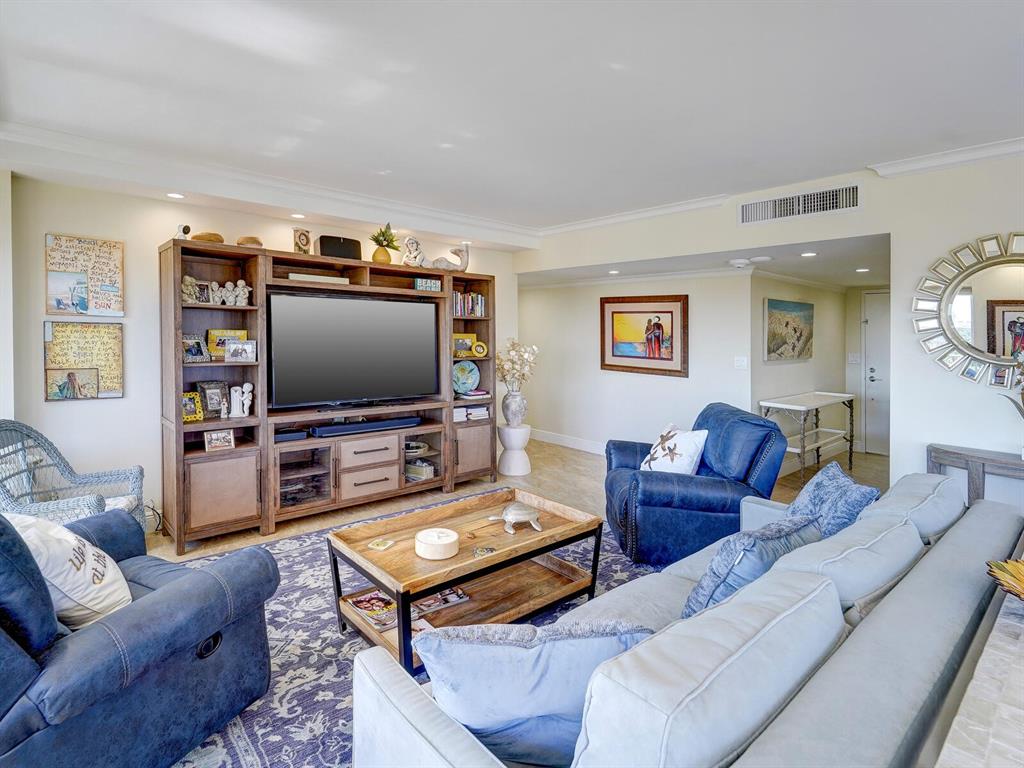 2500 East Las Olas Boulevard, Unit 901 Fort Lauderdale, FL 33301 - Photo 14 of 44 a living room with furniture and a flat screen tv