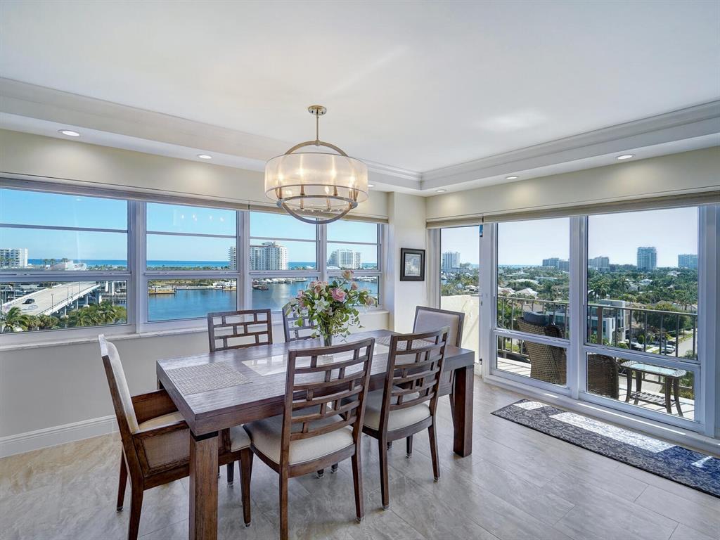 2500 East Las Olas Boulevard, Unit 901 Fort Lauderdale, FL 33301 - Photo 17 of 44 a view of a dining room with furniture window and outside view