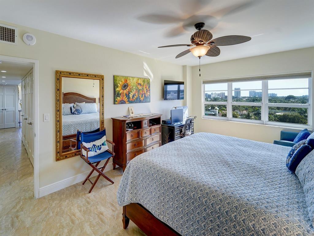 2500 East Las Olas Boulevard, Unit 901 Fort Lauderdale, FL 33301 - Photo 30 of 44 a bed room with a bed and a chair