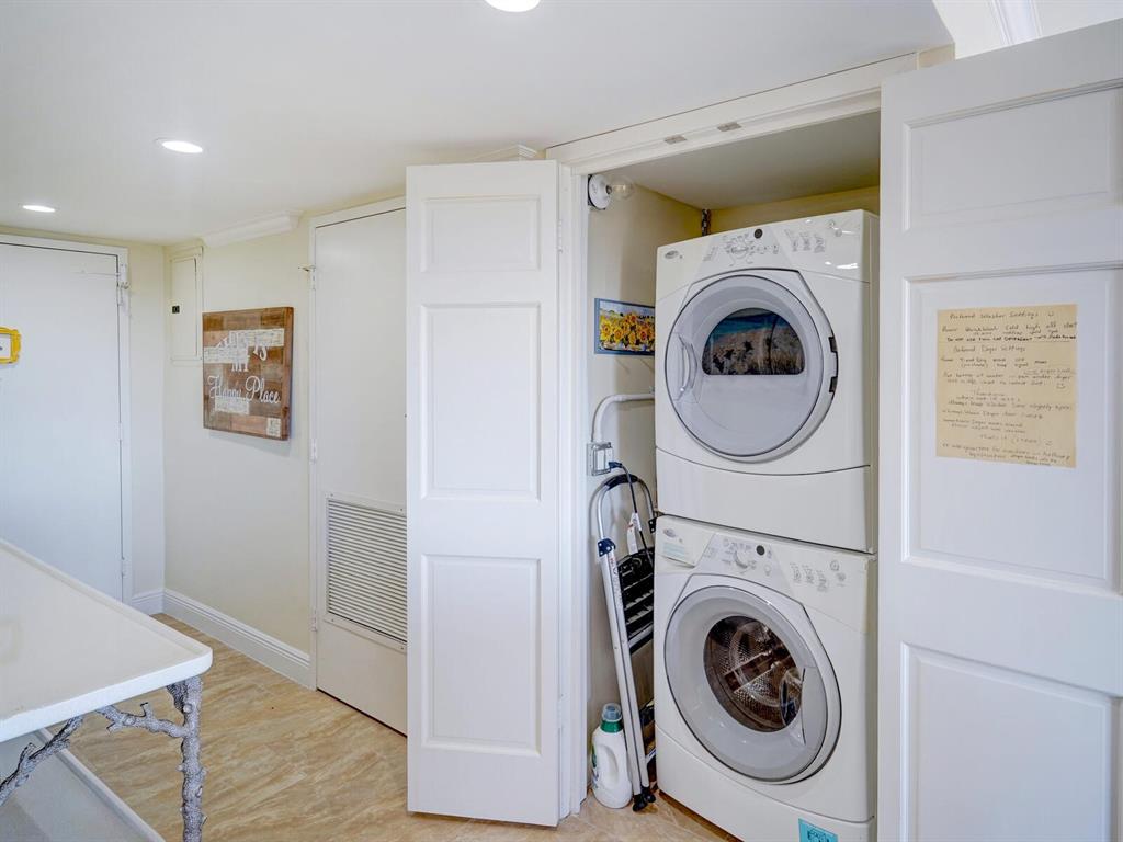 2500 East Las Olas Boulevard, Unit 901 Fort Lauderdale, FL 33301 - Photo 32 of 44 a view of a hallway with washer and dryer