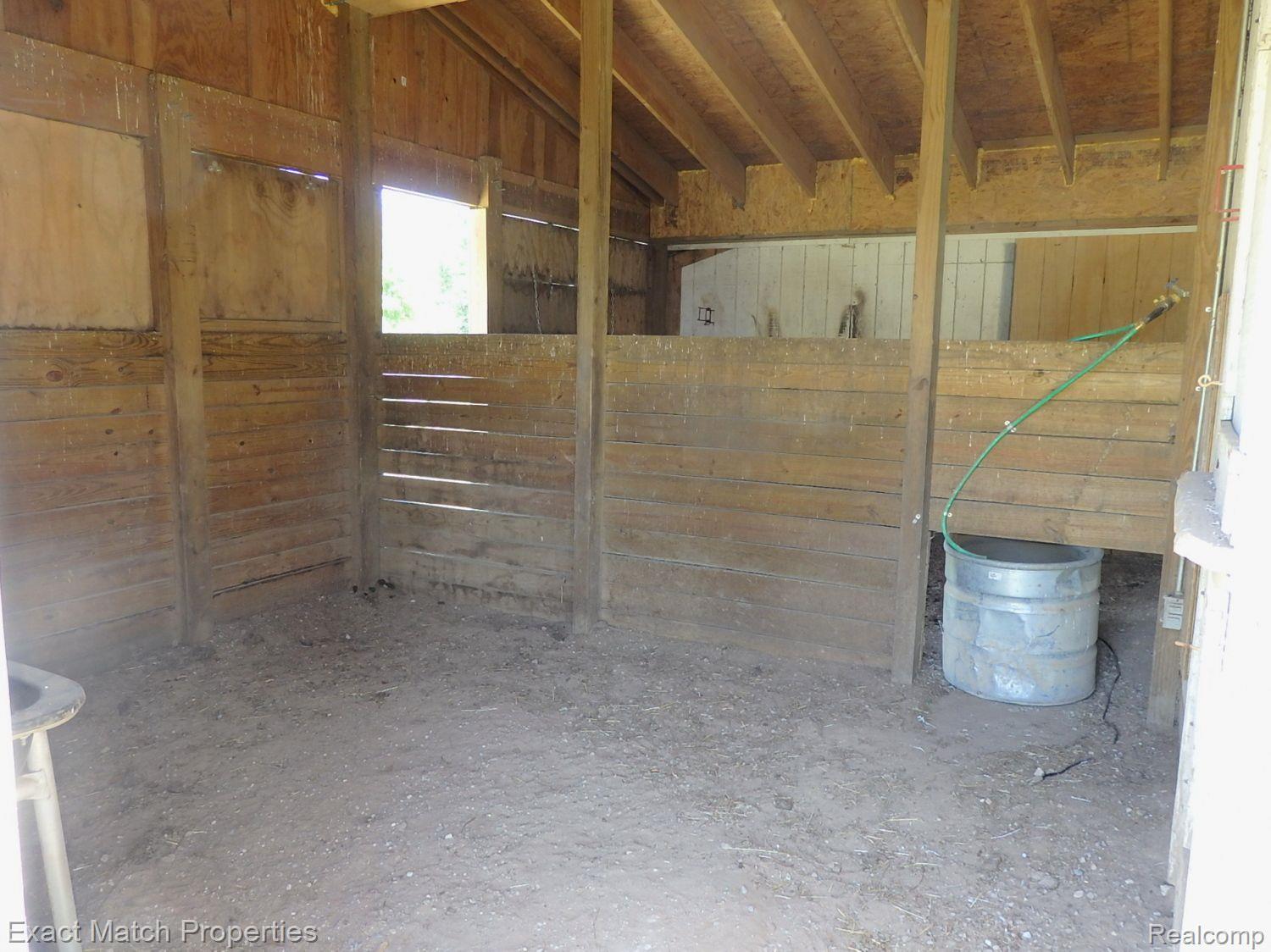 2980 East Rose Center Road Highland, MI 48356 - Photo 71 of 72 2 stalls are accessed from the outside.