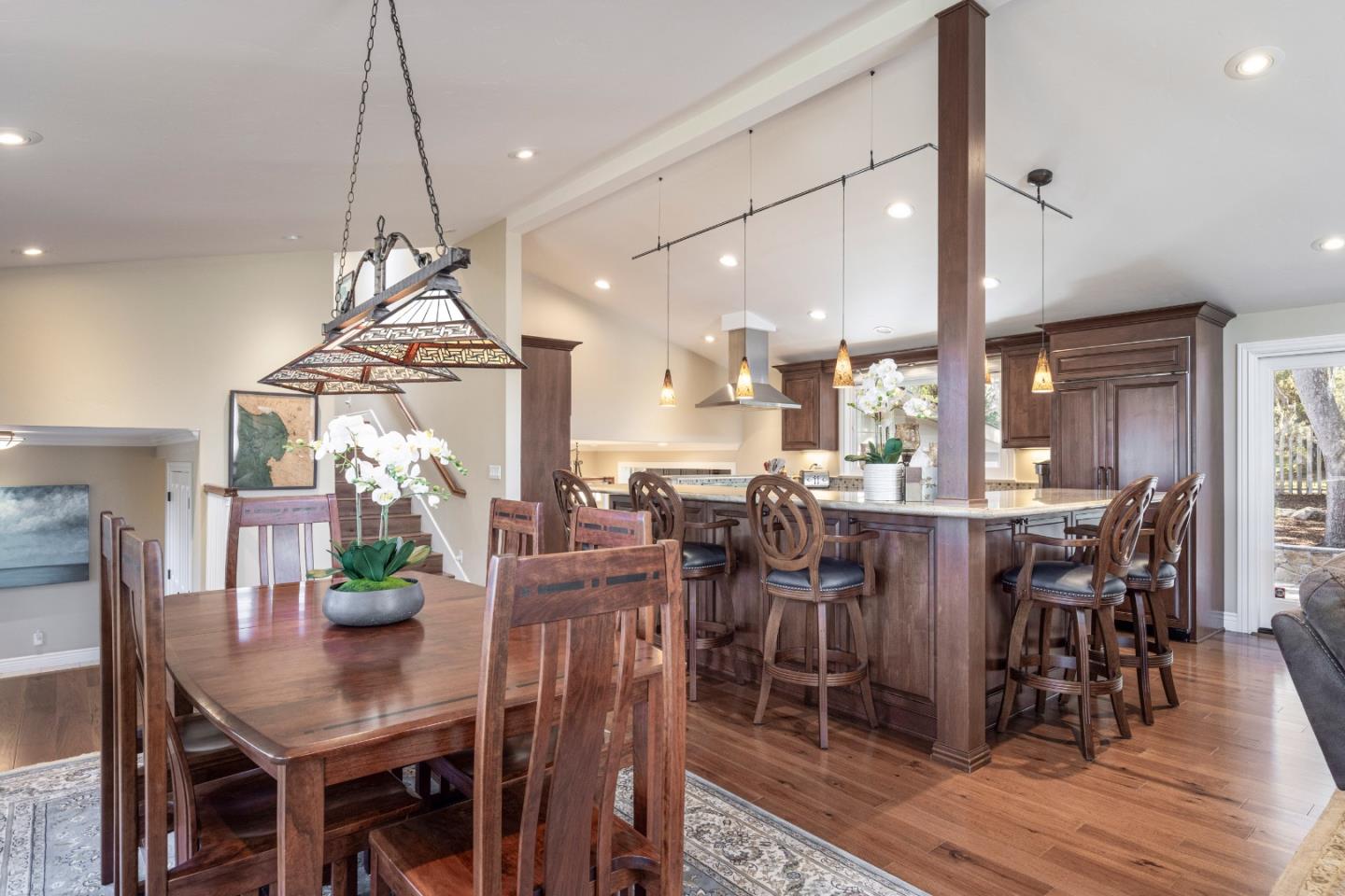3125 Bird Rock Road Pebble Beach, CA 93953 - Photo 11 of 35 a view of a dining room with furniture window and wooden floor