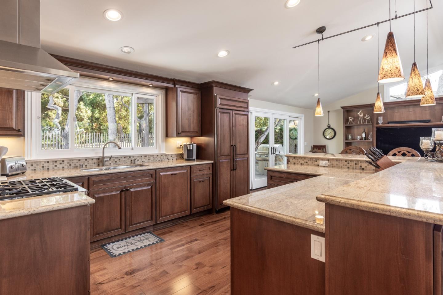 3125 Bird Rock Road Pebble Beach, CA 93953 - Photo 12 of 35 a kitchen with a sink stove and refrigerator