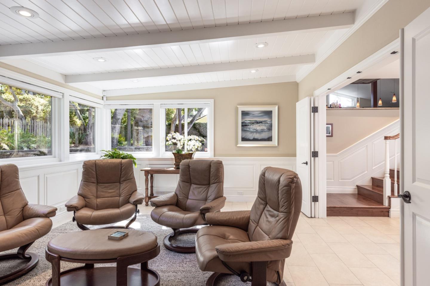 3125 Bird Rock Road Pebble Beach, CA 93953 - Photo 16 of 35 a living room with furniture and a floor to ceiling window
