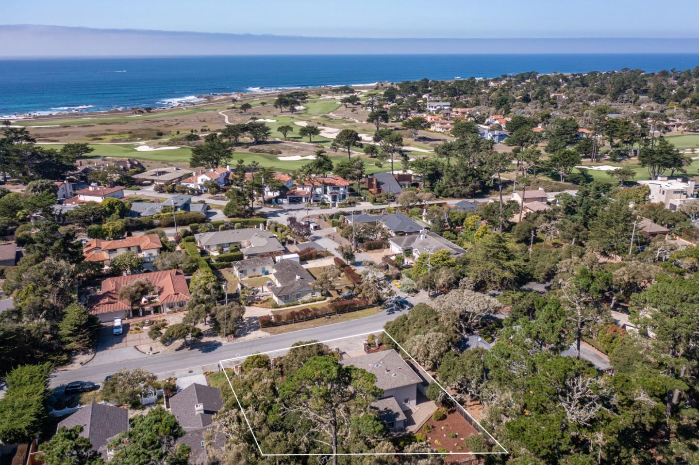 3125 Bird Rock Road Pebble Beach, CA 93953 - Photo 34 of 35 an aerial view of residential building with parking and yard