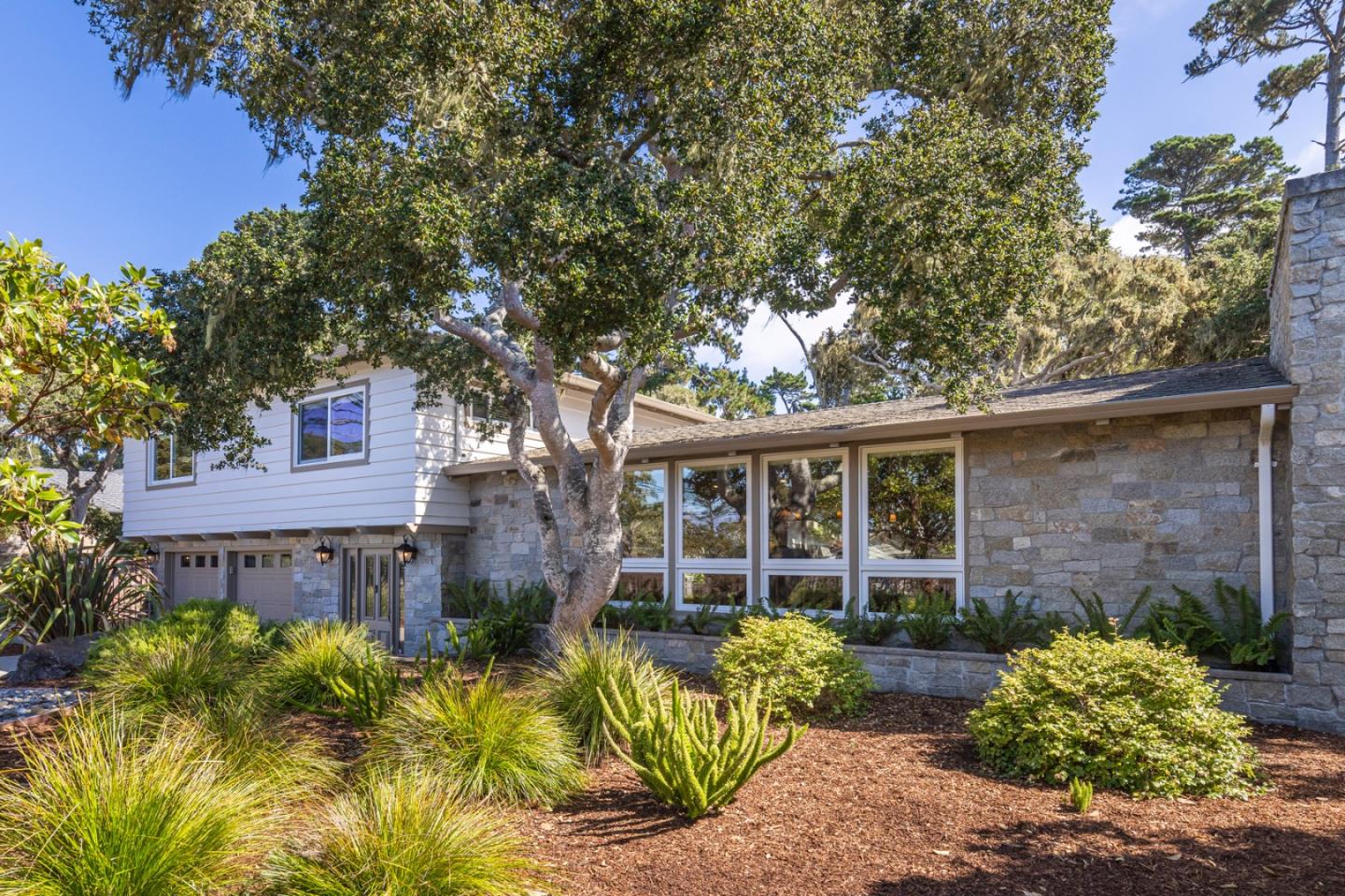 3125 Bird Rock Road Pebble Beach, CA 93953 - Photo 4 of 35 front view of a house with a large window