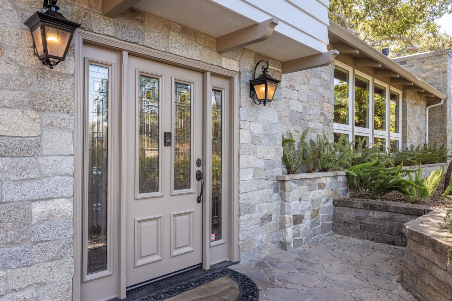 3125 Bird Rock Road Pebble Beach, CA 93953 - Photo 6 of 35 a view of a brick door of the house