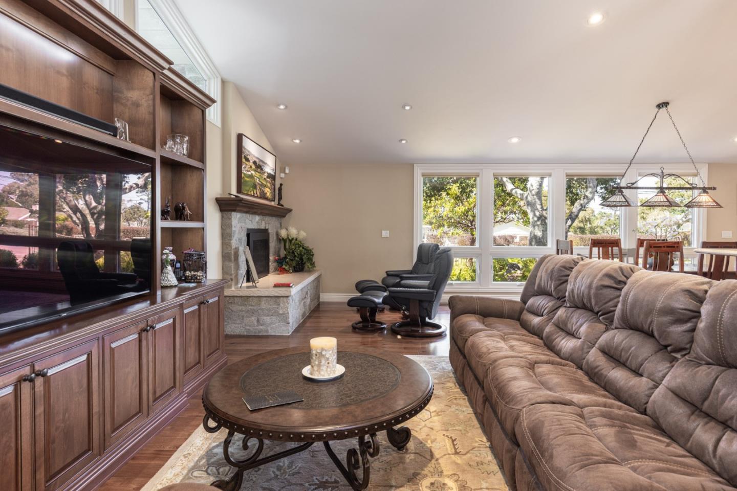 3125 Bird Rock Road Pebble Beach, CA 93953 - Photo 9 of 35 a living room with furniture and a large window