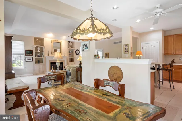 a view of a livingroom with furniture window and wooden floor