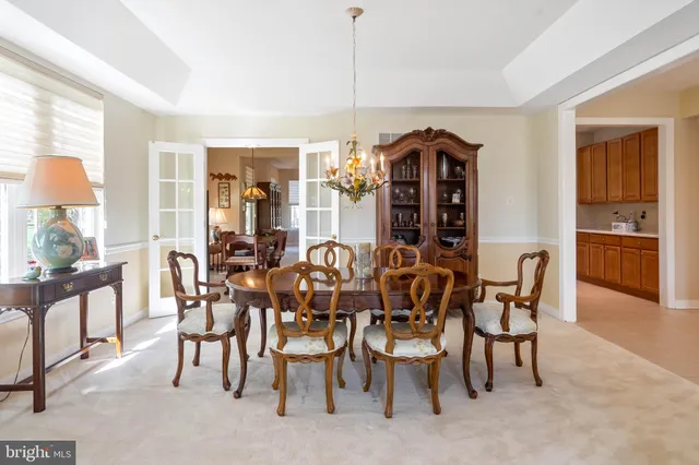 a view of a livingroom with furniture and a window