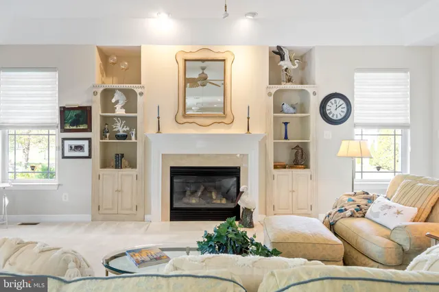 a bathroom with a sink vanity granite and a toilet