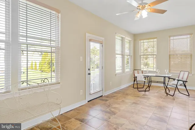 a view of staircase with living room