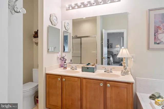 a room with a dresser and a mirror