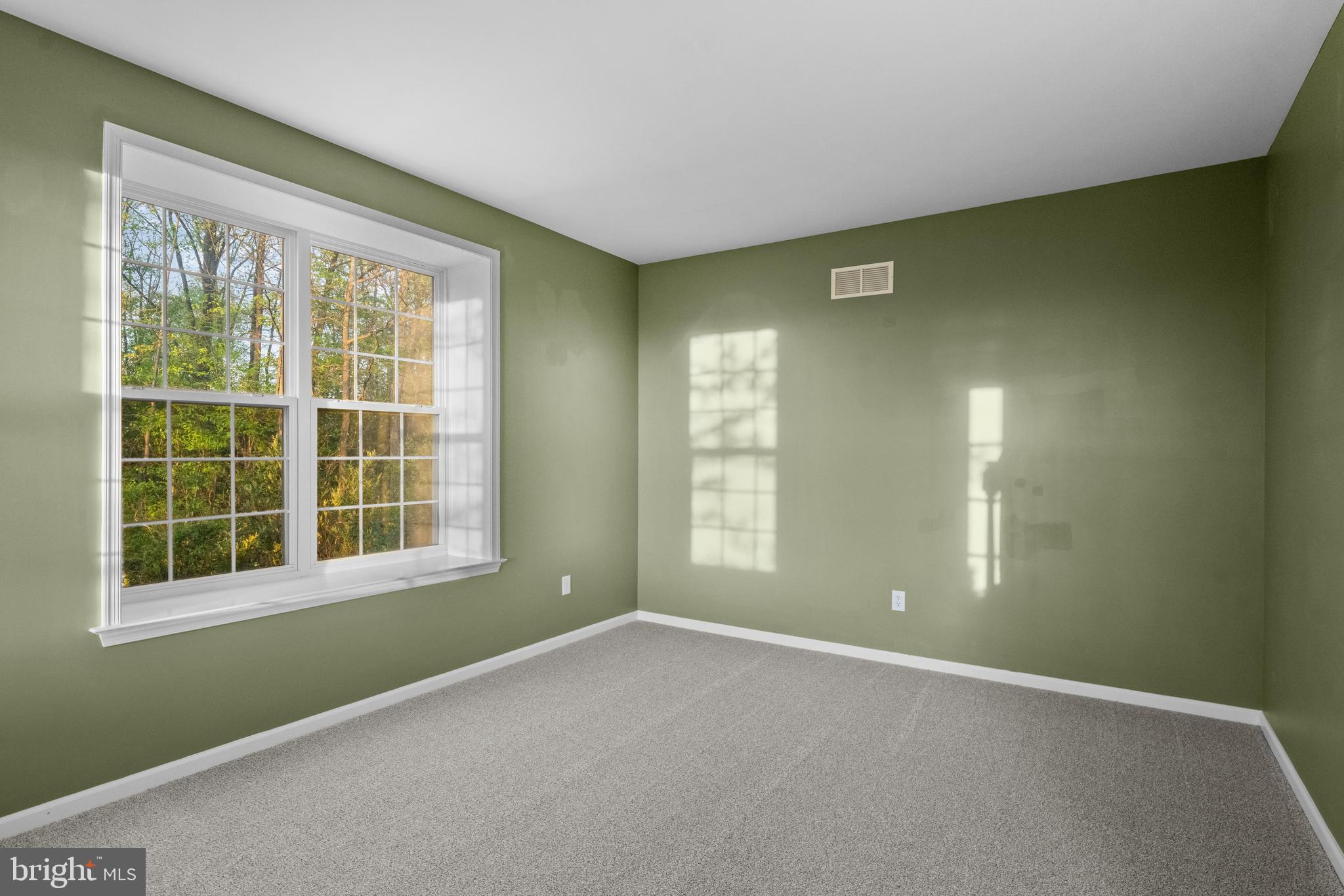 419 Townsend Drive Perkasie, PA 18944 - Photo 15 of 37 a view of an empty room with a window