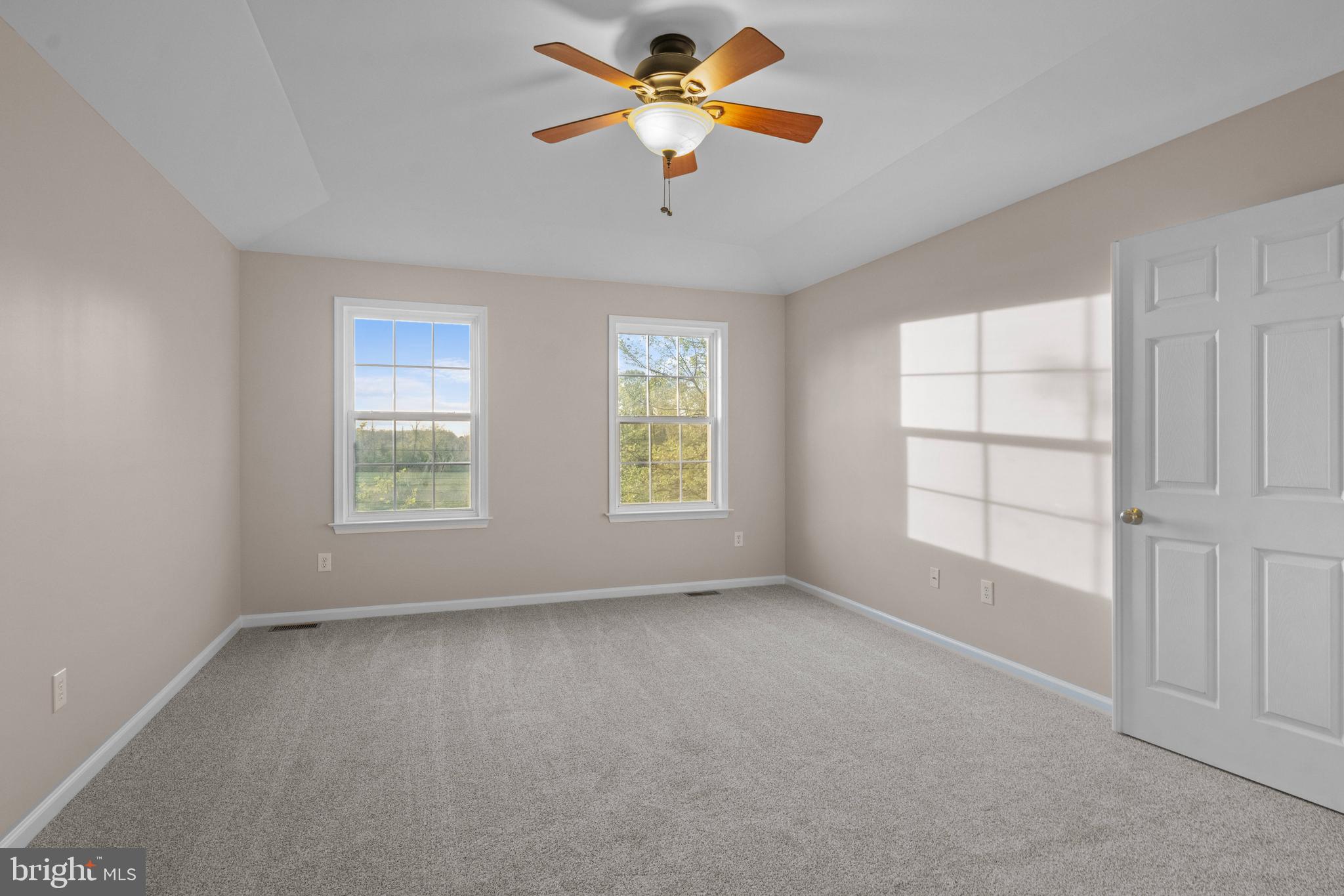 419 Townsend Drive Perkasie, PA 18944 - Photo 20 of 37 a view of room with a ceiling fan and window