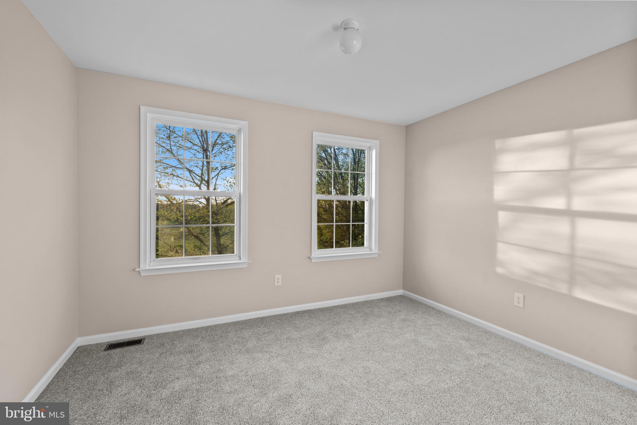 419 Townsend Drive Perkasie, PA 18944 - Photo 24 of 37 an empty room with windows