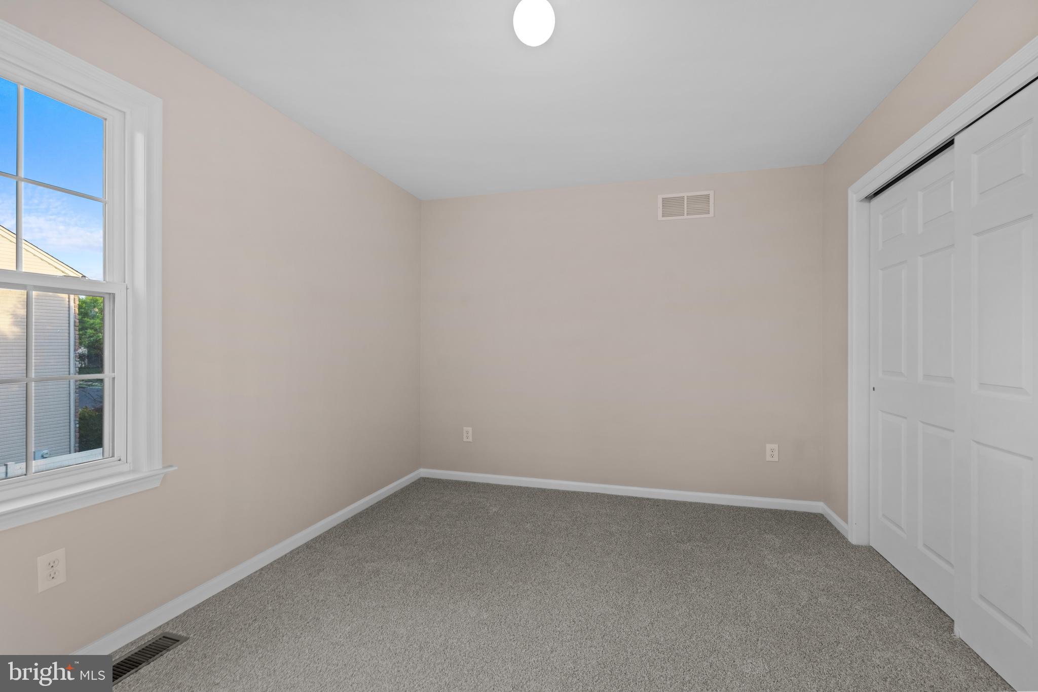 419 Townsend Drive Perkasie, PA 18944 - Photo 27 of 37 an empty room with a window