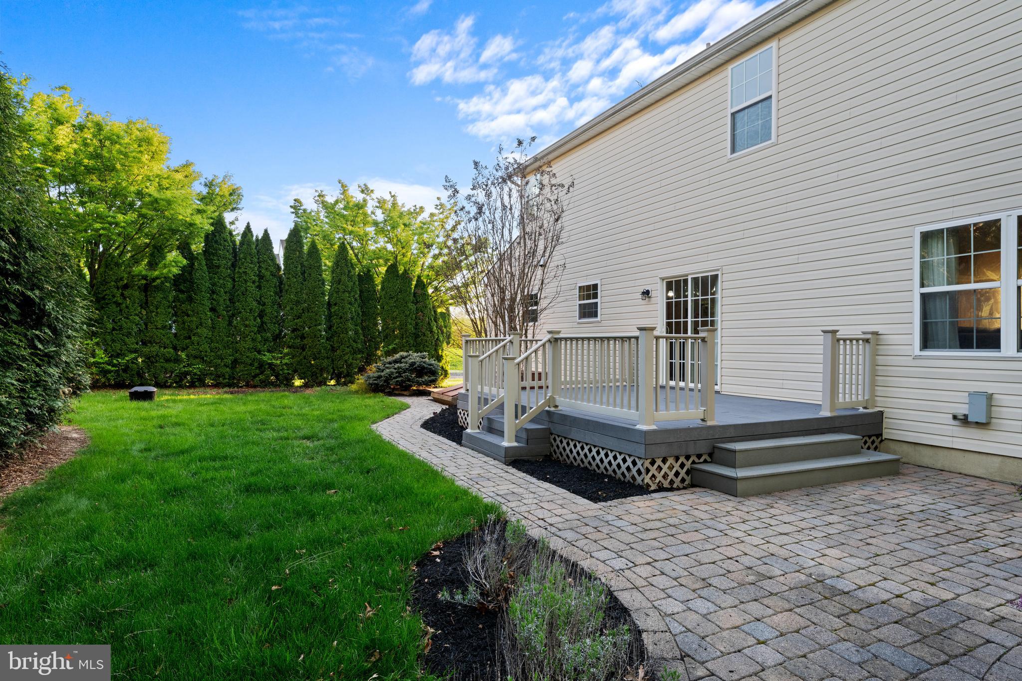 419 Townsend Drive Perkasie, PA 18944 - Photo 3 of 37 a front view of a house with garden and trees