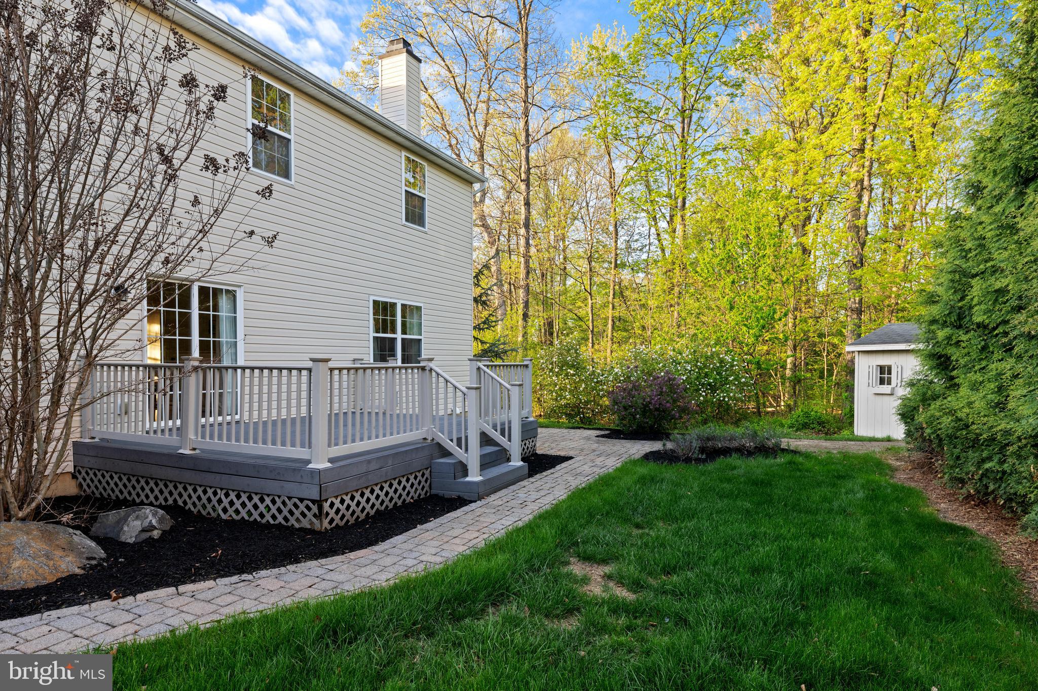 419 Townsend Drive Perkasie, PA 18944 - Photo 31 of 37 a view of a house with a yard and deck