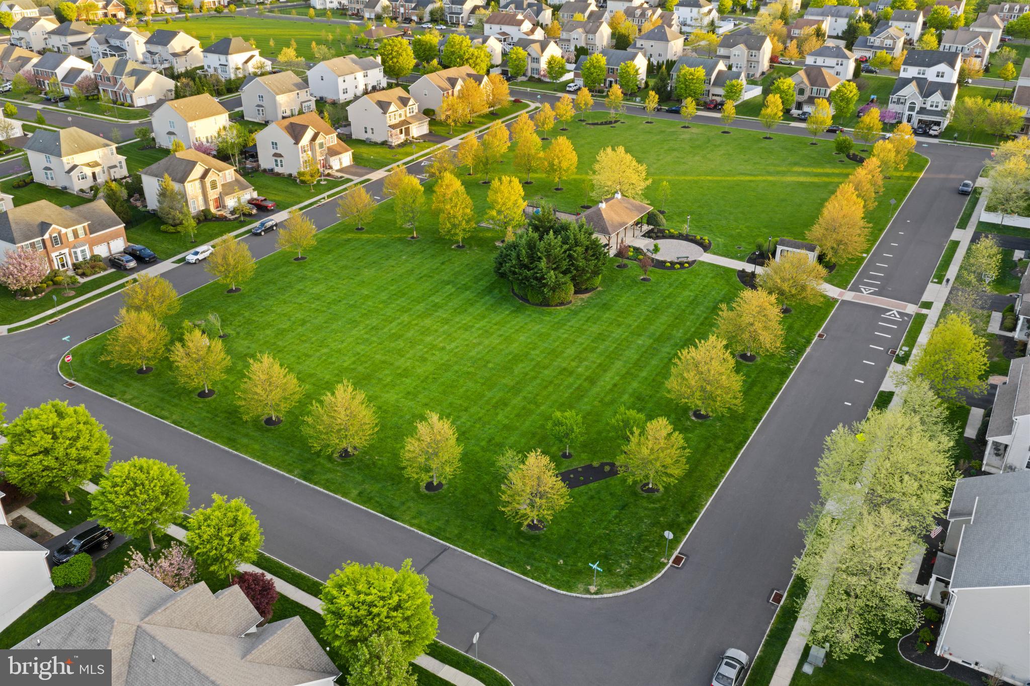 419 Townsend Drive Perkasie, PA 18944 - Photo 34 of 37 a view of a lake with a yard