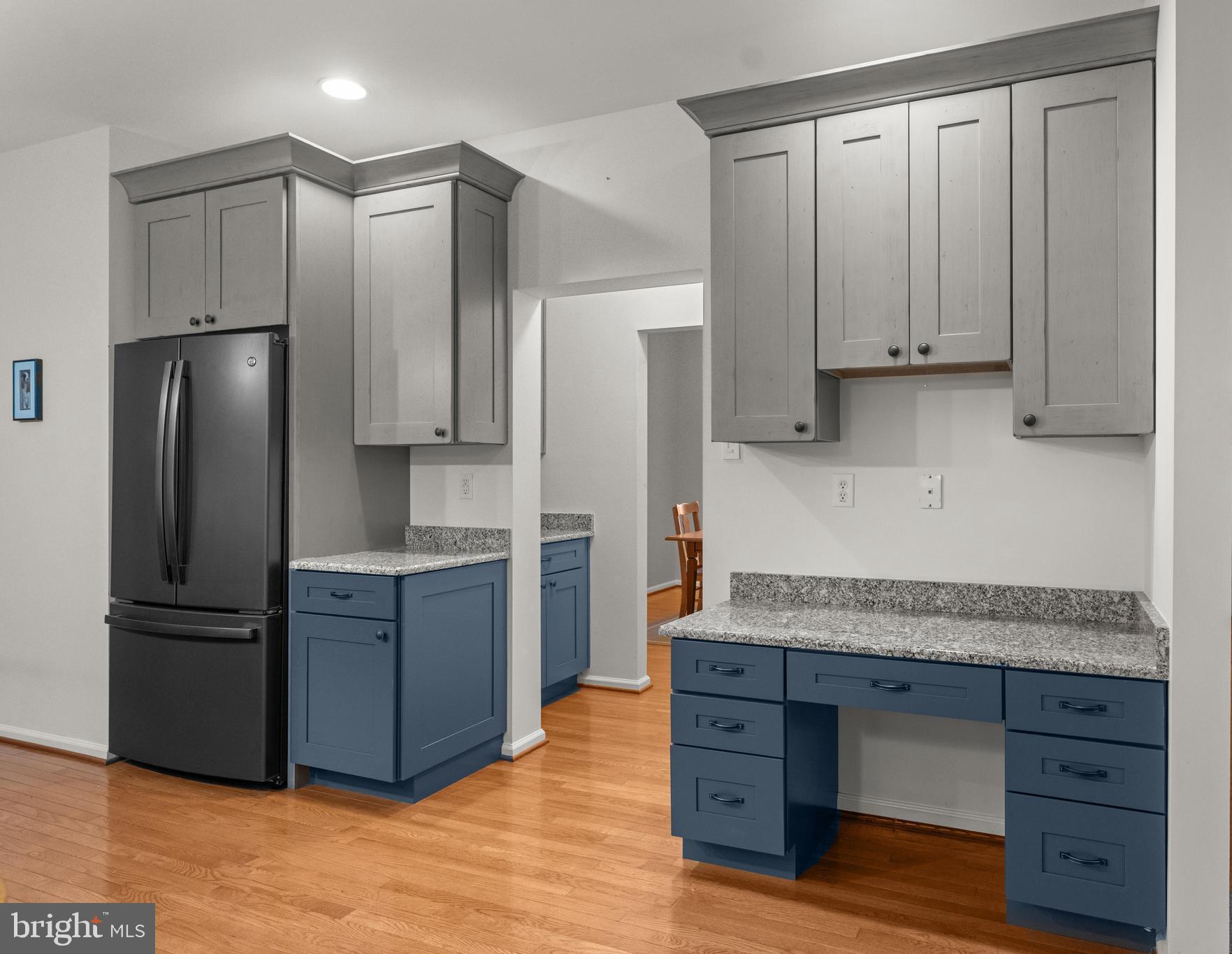 419 Townsend Drive Perkasie, PA 18944 - Photo 7 of 37 a kitchen with granite countertop stainless steel appliances and refrigerator