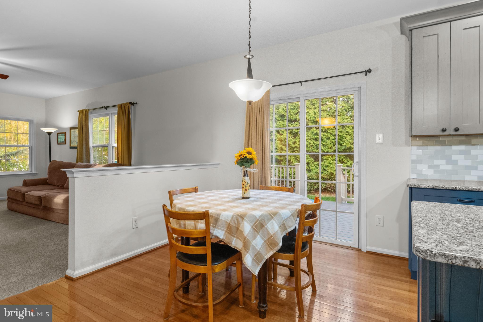 419 Townsend Drive Perkasie, PA 18944 - Photo 10 of 37 a view of a dining room with furniture window and wooden floor