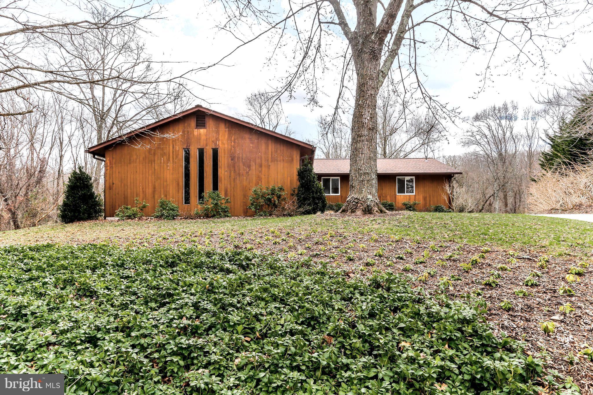 1713 Gamewell Road Silver Spring, MD 20905 - Photo 1 of 30 a front view of house with yard and trees around