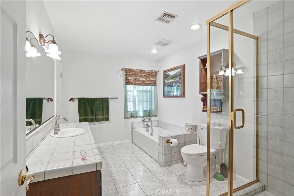 30414 Sloan Canyon Road Castaic, CA 91384 - Photo 13 of 70 Full Guest Bathroom Main Level