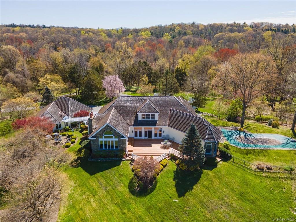 a aerial view of a house with a big yard