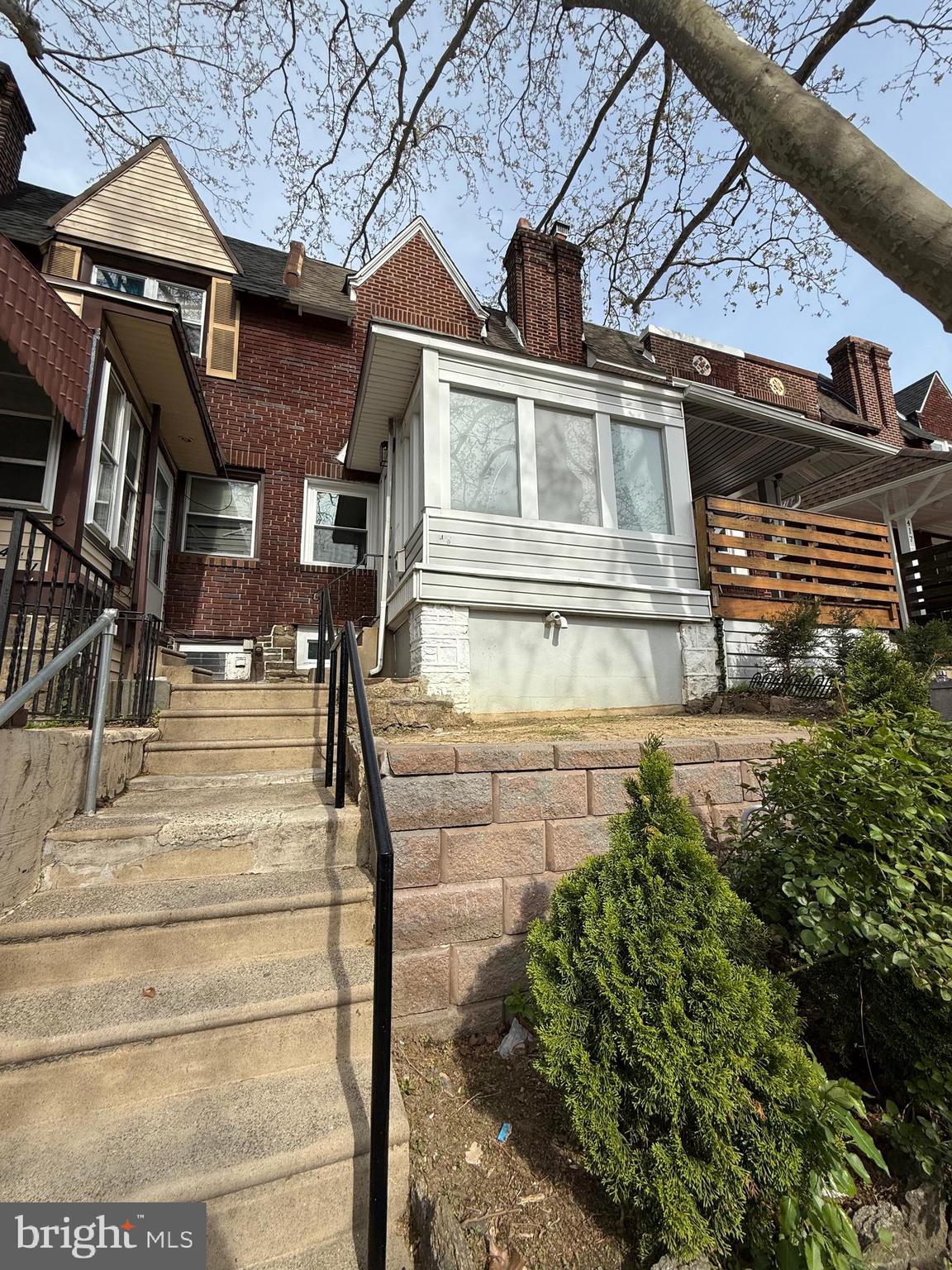 413 Copley Road Upper Darby, PA 19082 - Photo 21 of 21 a front view of a house with a yard
