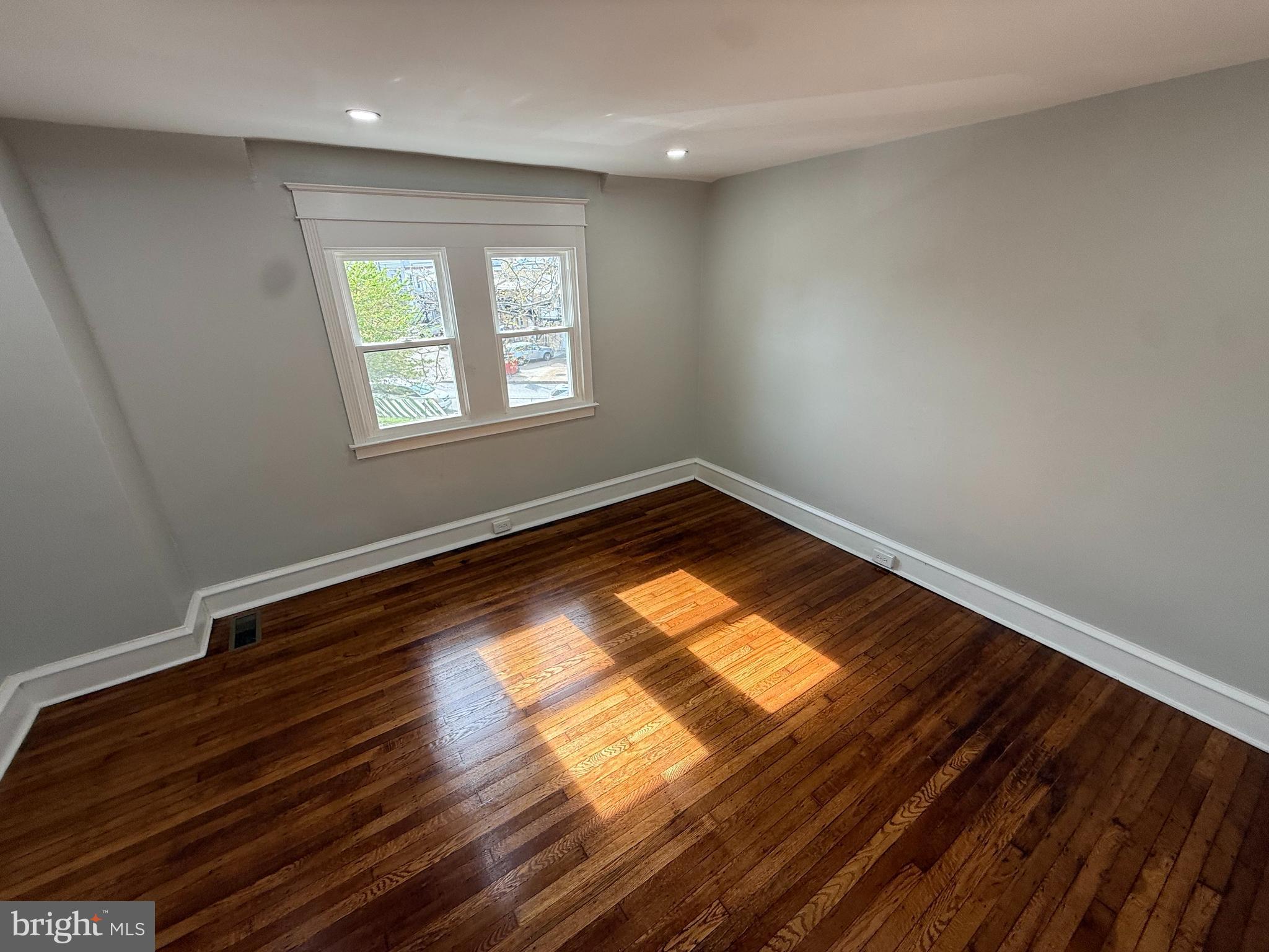 413 Copley Road Upper Darby, PA 19082 - Photo 9 of 21 a view of empty room with window