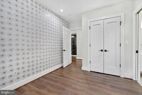 a view of wooden floor in an empty room