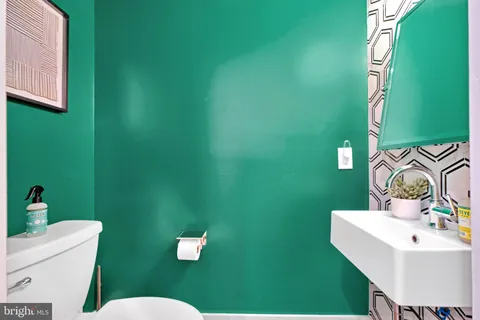 a view of a hallway with washer and dryer