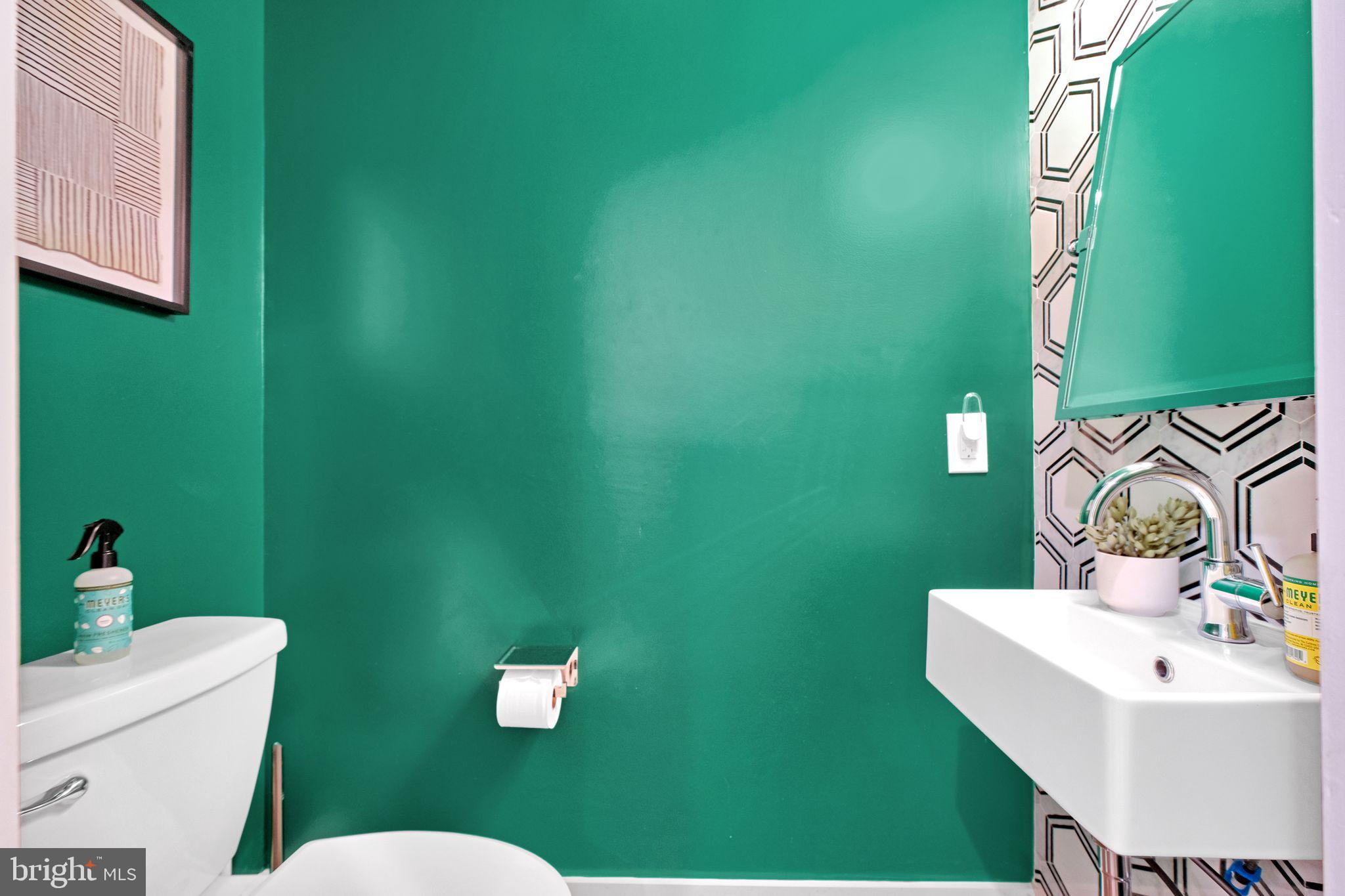 1419 Upshur Street Northwest, Unit 1 Washington, DC 20011 - Photo 23 of 28 a bathroom with a sink and a mirror