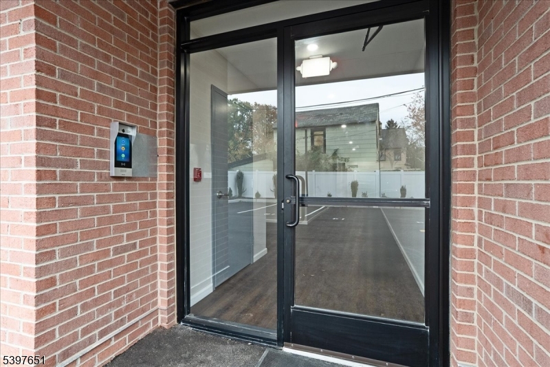 224 Broad Street Bloomfield, NJ 07003 - Photo 26 of 45 a view of a glass door and a window