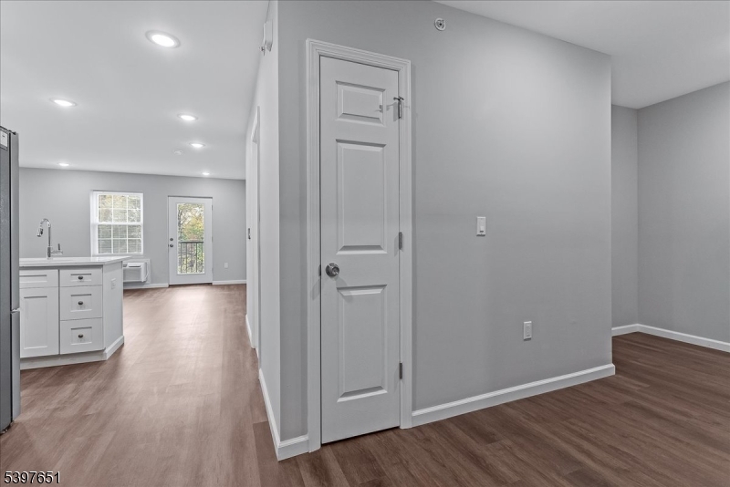 224 Broad Street Bloomfield, NJ 07003 - Photo 3 of 45 wooden floor in an empty room with a window