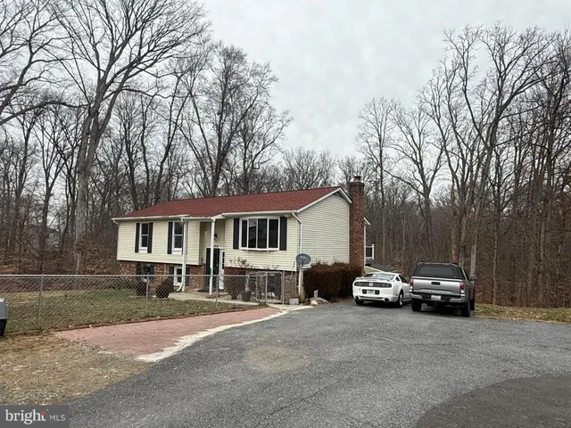 a car parked in front of a house