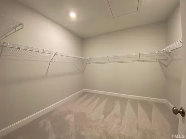 a view of a room with racks on the wall