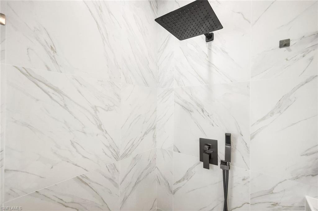 650 Luisa Lane, Unit 4 Naples, FL 34104 - Photo 13 of 19 a close up of a white marble wall