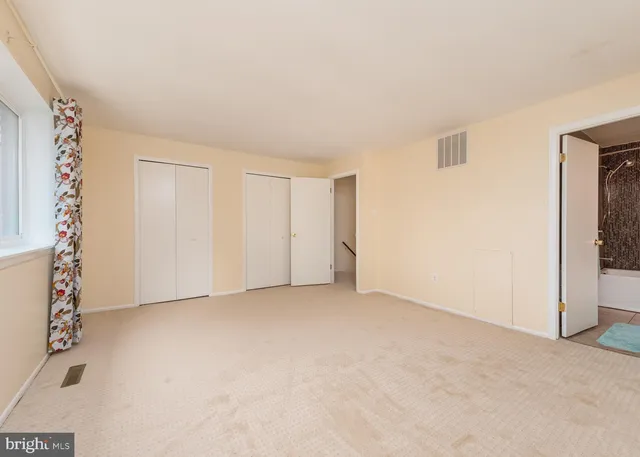 an empty room with windows