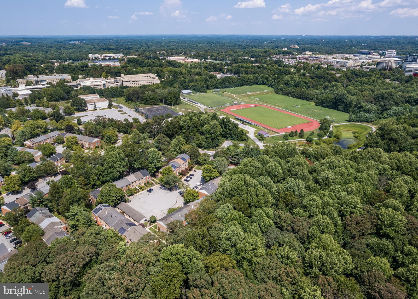 10544 East Wind Way Columbia, MD 21044 - Photo 40 of 42 an aerial view of residential houses with outdoor space and trees