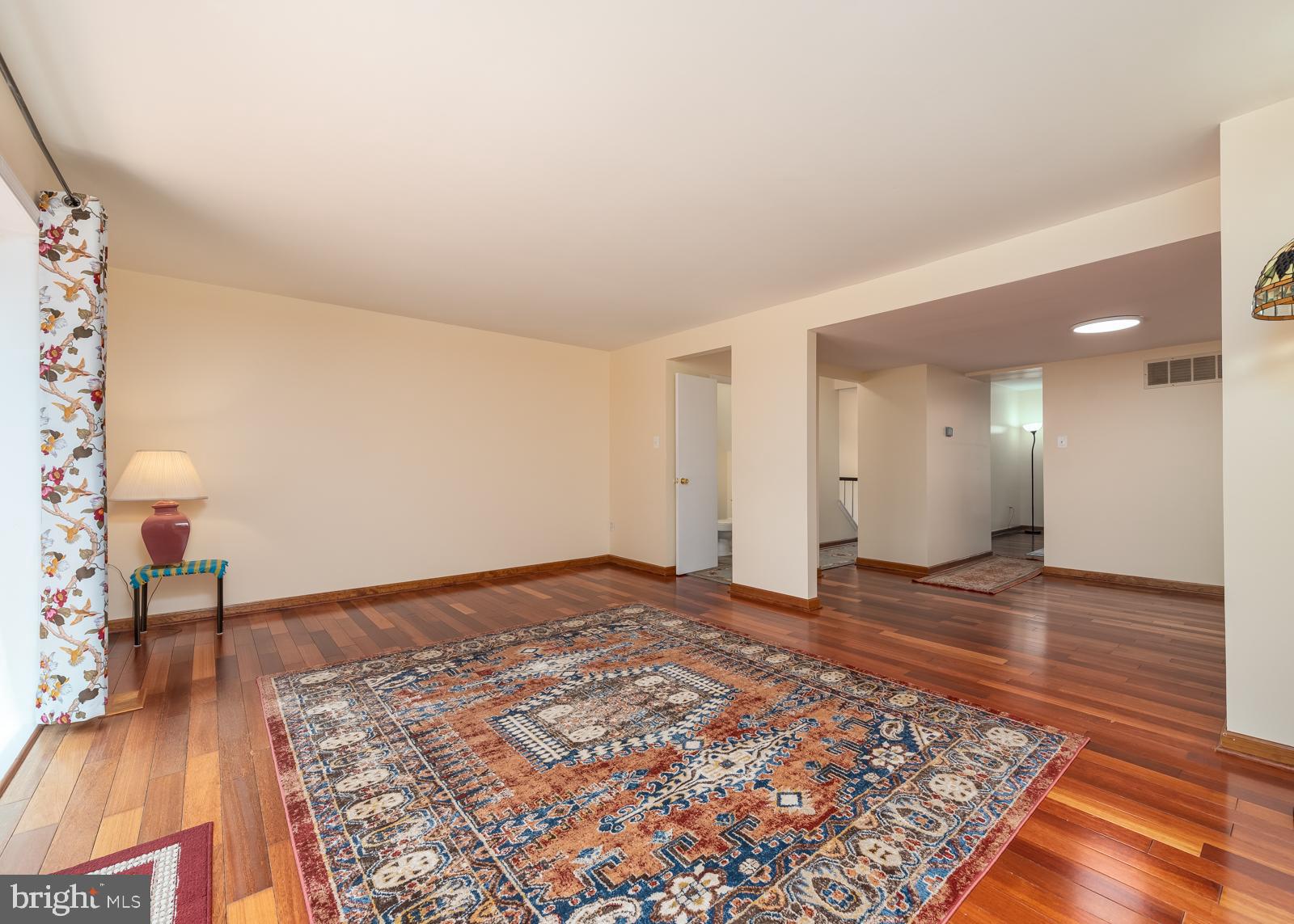 10544 East Wind Way Columbia, MD 21044 - Photo 4 of 42 a view of a room with wooden floor and furniture