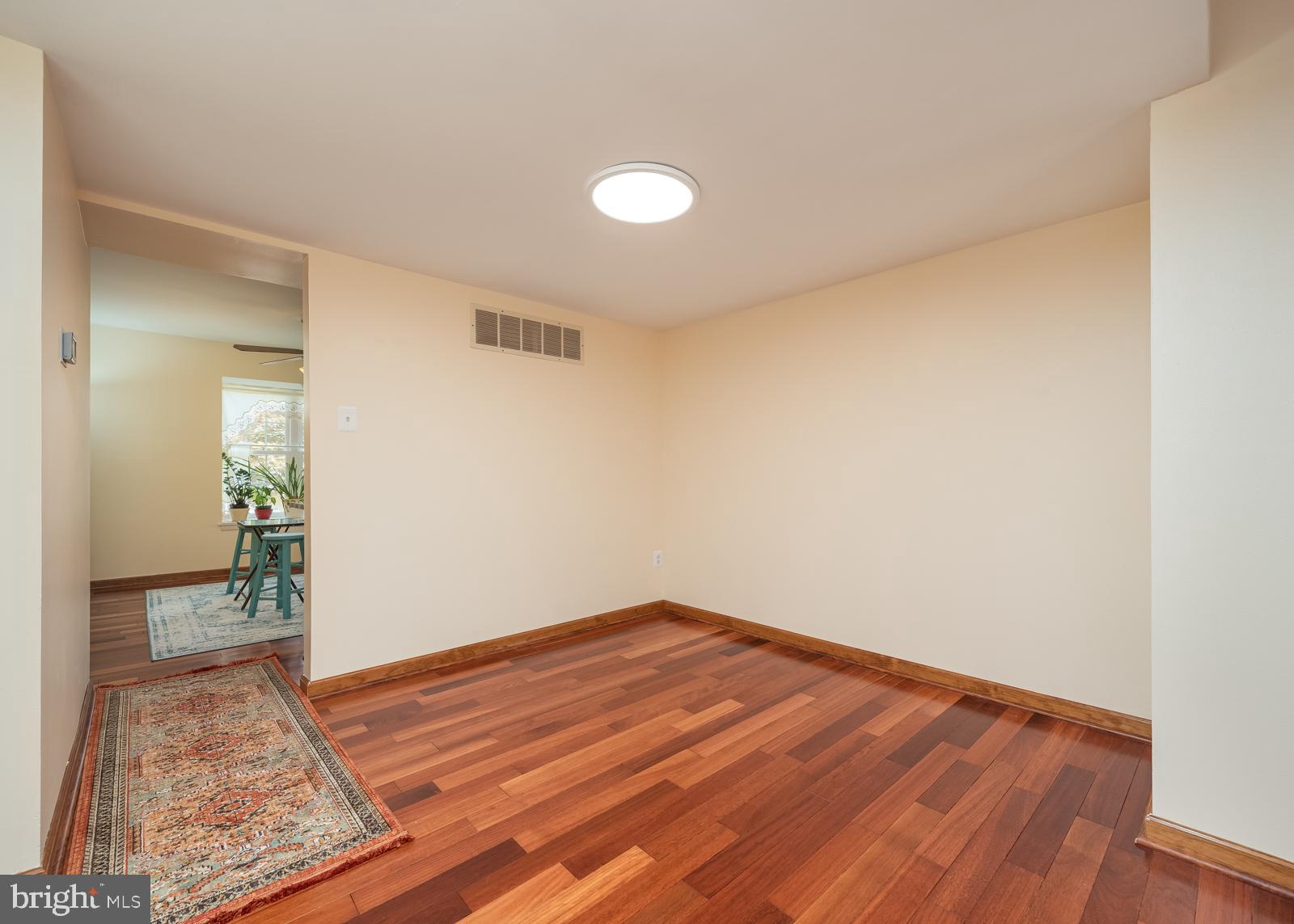 10544 East Wind Way Columbia, MD 21044 - Photo 5 of 42 a view of empty room with wooden floor