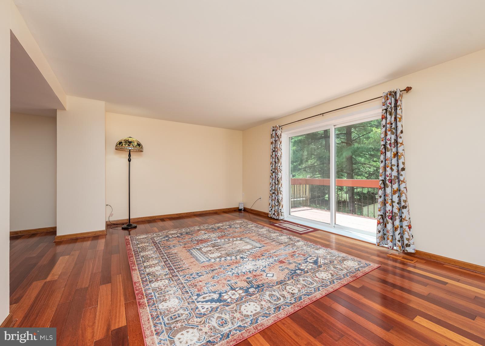 10544 East Wind Way Columbia, MD 21044 - Photo 9 of 42 a view of a room with wooden floor and window