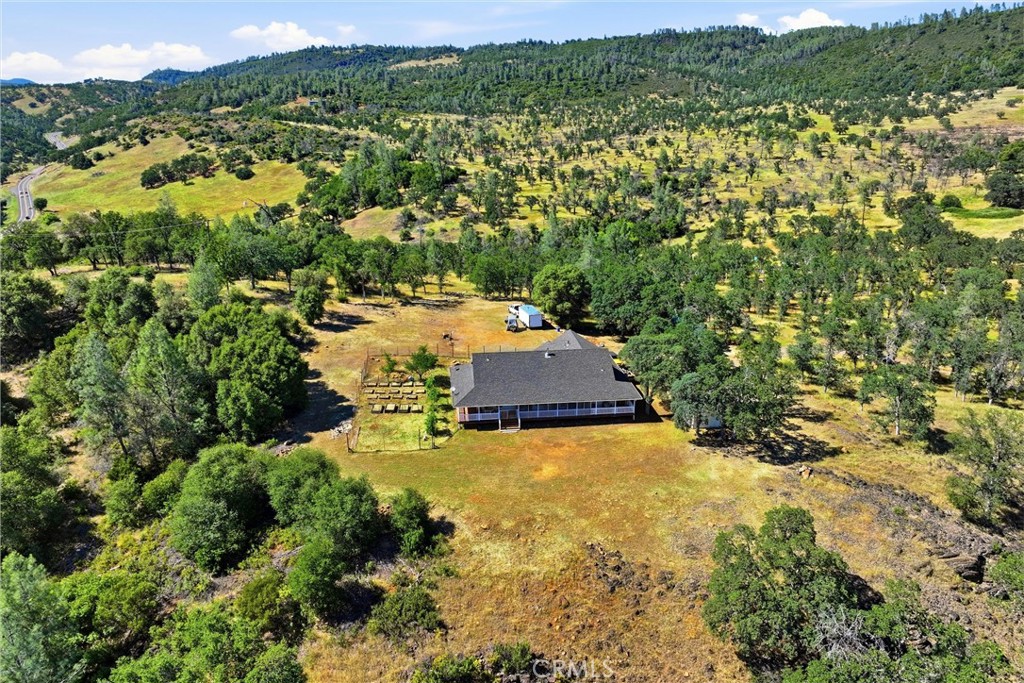 16965 Spruce Grove Road Hidden Valley Lake, CA 95467 - Photo 28 of 34 an aerial view of residential houses with outdoor space and trees