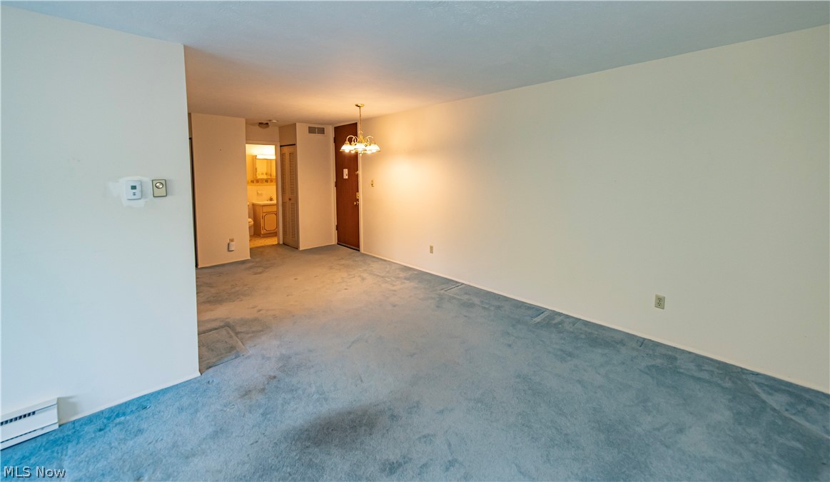 3064 Kent Road, Unit 309A Stow, OH 44224 - Photo 9 of 27 Open concept living room and dining area