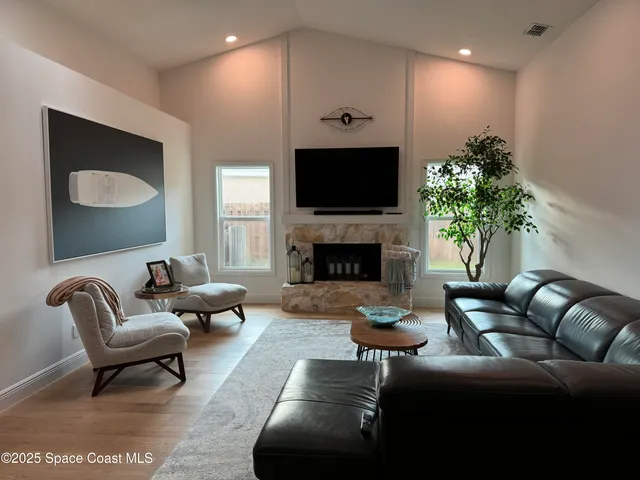 a living room with a couch and a table